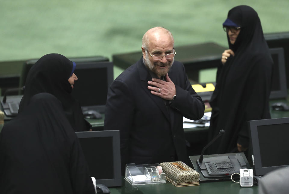 Mohammad Bagher Qalibaf, center, greets lawmakers after being elected as speaker of the parliament, in Tehran, Iran, Thursday, May 28, 2020. Iran's parliament elected Qalibaf, a former mayor of Tehran tied to the Revolutionary Guard, as its next speaker Thursday, solidifying hard-line control of the body as tensions between the U.S. and the Islamic Republic remain high over its collapsed nuclear deal. (AP Photo/Vahid Salemi)