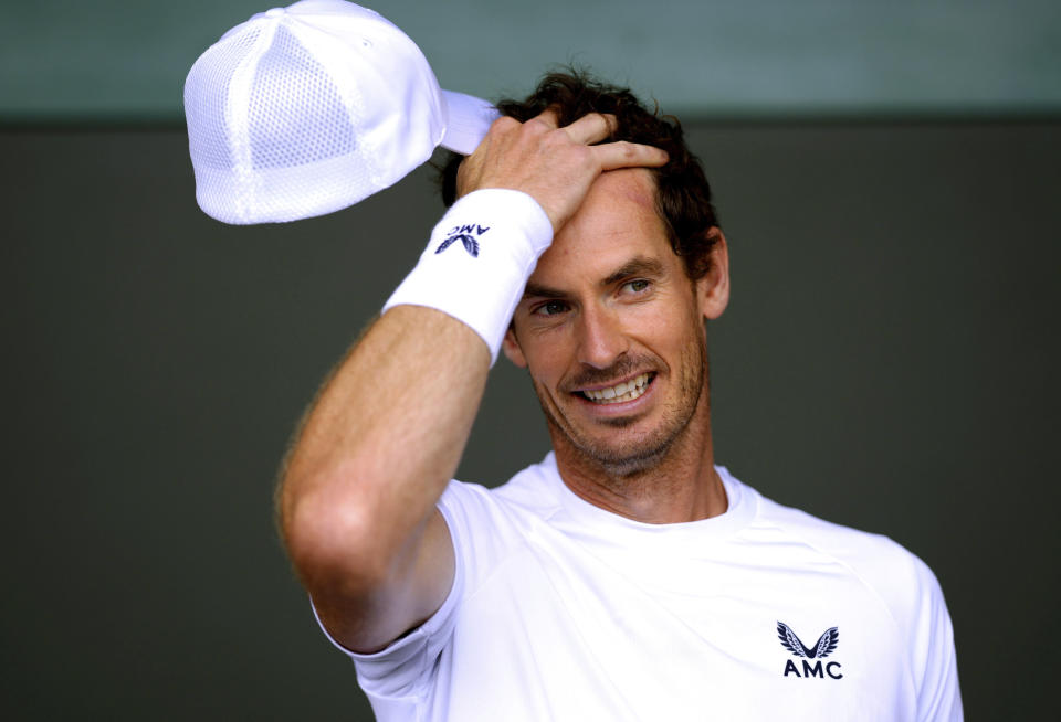 Britain's Andy Murray gestures, during a practice session ahead of the 2022 Wimbledon Championship at the All England Lawn Tennis and Croquet Club, Wimbledon, London, Saturday, June 25, 2022. (John Walton/PA via AP)