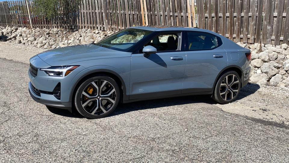 The 2021 Polestar 2 electric car has a long hood and roofline, 4.45-second 0-60 mph acceleration and responsive handling.