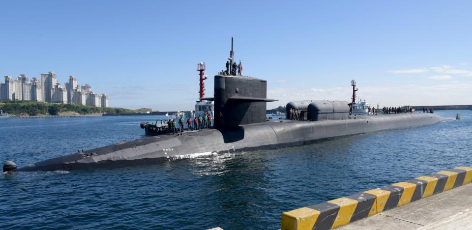 The <em>Ohio</em> class SSGN USS <em>Michigan</em> seen during a very rare public port visit to Busan, South Korea, in 2017 at a time of heightened tensions with North Korea. <em>USN</em>