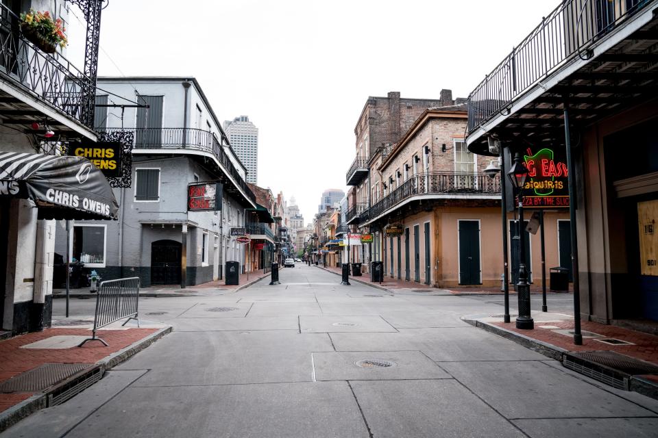 Typically filled with people, Bourbon Street in New Orleans is nearly empty on the first day of Jazz Fest 2020 on April 23.