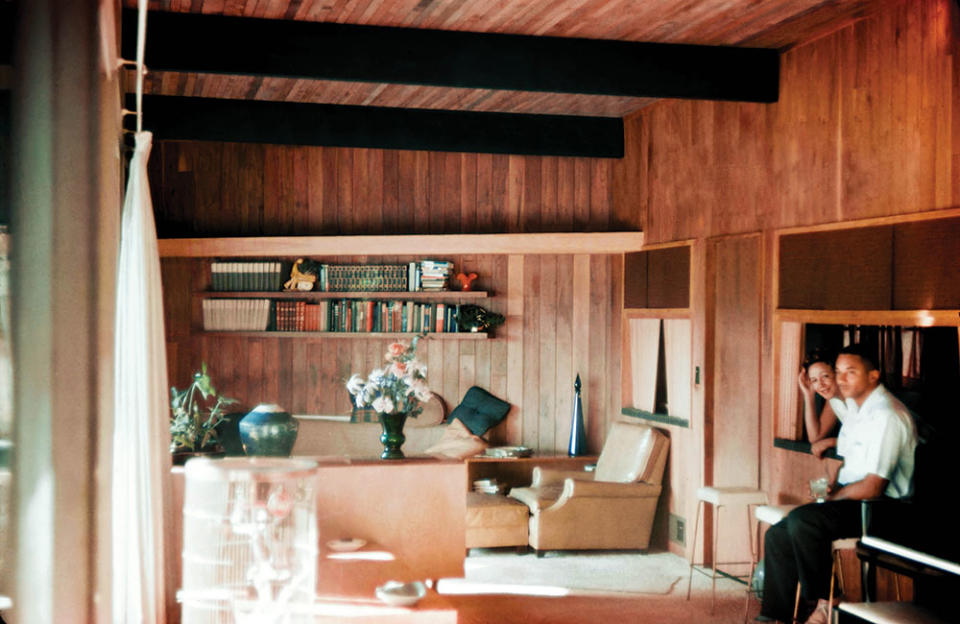 An archival shot of the Robinsons in their midcentury modern home in West Adams.