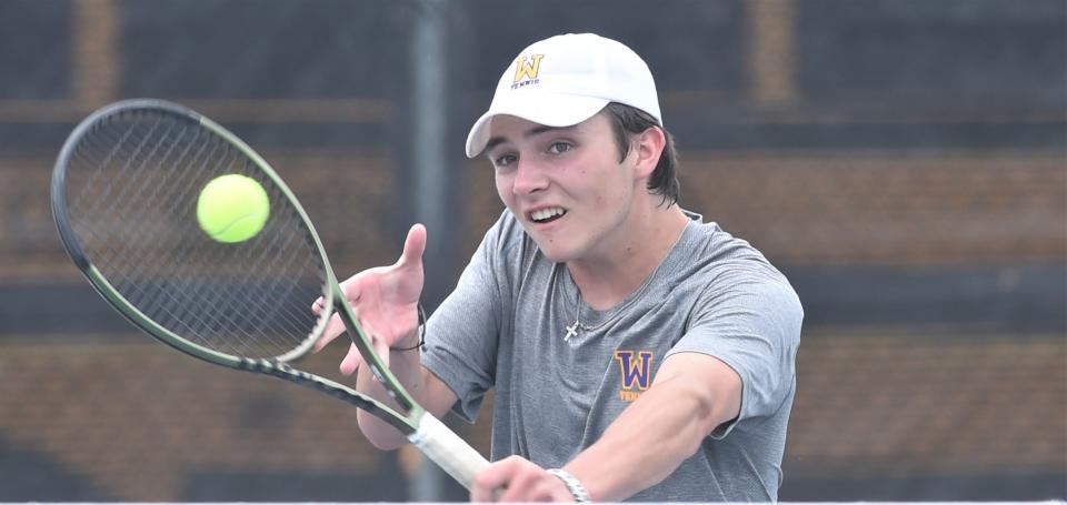 Abilene Wylie's Trevor Short returns a shot at the net against Frisco Lebanon Trail's Ashna Potluri and Aaditt Risha in the Class 5A state semifinal mixed doubles match. Short and teammate Stealey Crousen won the match 6-4, 6-1 on Tuesday at Northside Tennis Club in Helotes.
