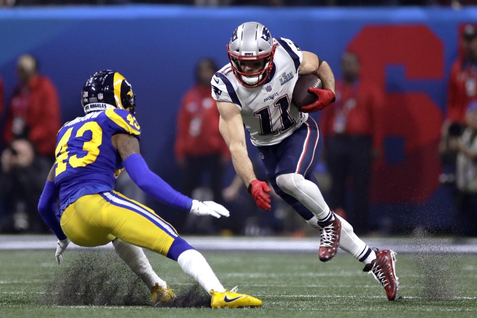 <p>New England Patriots’ Julian Edelman, right, tries to elude Los Angeles Rams’ John Johnson III (43) after catching a pass during the second half of the NFL Super Bowl 53 football game Sunday, Feb. 3, 2019, in Atlanta. (AP Photo/Carolyn Kaster) </p>