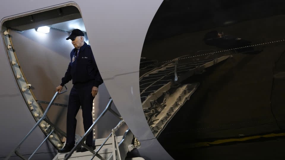 President Joe Biden gestures to reporters as he steps off Air Force One upon arrival at Dover Air Force Base on July 17, 2024. - Kent Nishimura/AFP/Getty Images