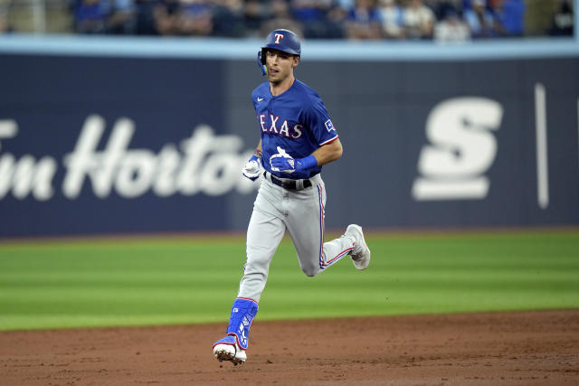 Heim, Carter help Rangers hammer Blue Jays to start crucial series