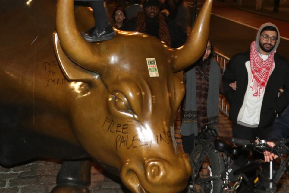 The graffiti written in black marker was located behind the ear of the bull while “Free Palestine” was scrawled across its face, according to photos. William C Lopez/New York Post