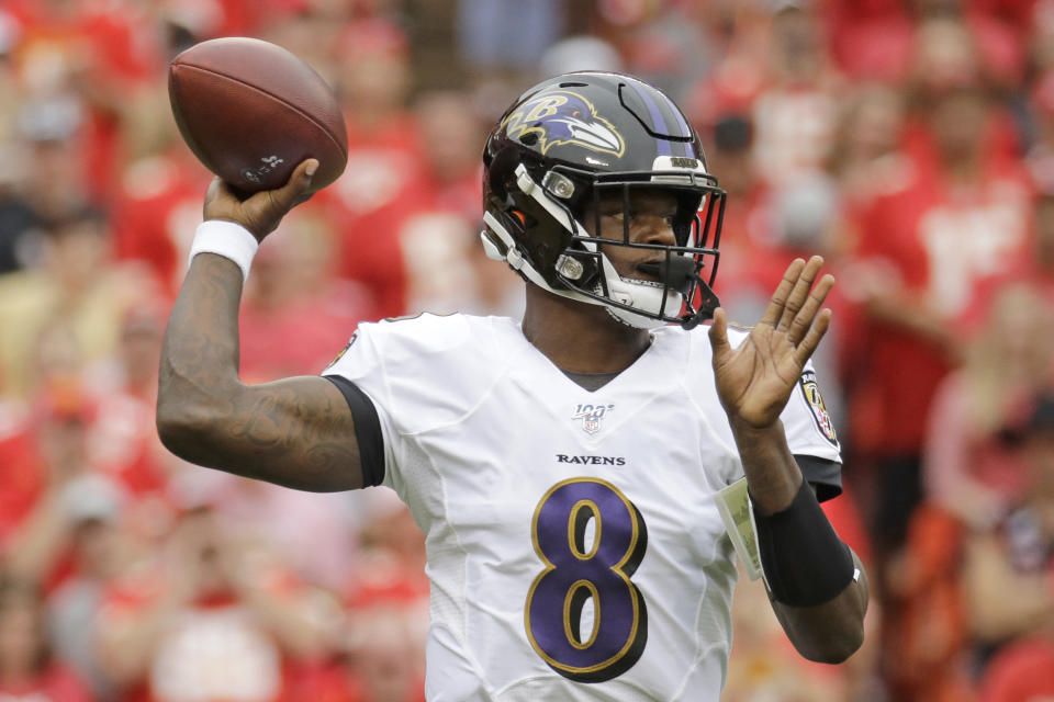 Baltimore Ravens quarterback Lamar Jackson (8) throws a pass during the first half of an NFL football game against the Kansas City Chiefs in Kansas City, Mo., Sunday, Sept. 22, 2019. (AP Photo/Charlie Riedel)