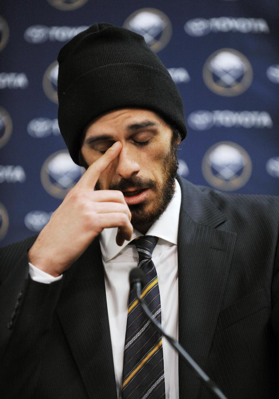 Former Buffalo Sabres goaltender Ryan Miller collects his thoughts during a news conference as he talked about his years with the NHL hockey team, Friday, Feb. 28, 2014, in Buffalo, N.Y. Miller and Steve Ott were traded to the St. Louis Blues Friday night for goalie Jaroslav Halak, forward Chris Stewart, prospect William Carrier, a 2015 first-round pick and a 2016 third-round pick. (AP Photo/Gary Wiepert)