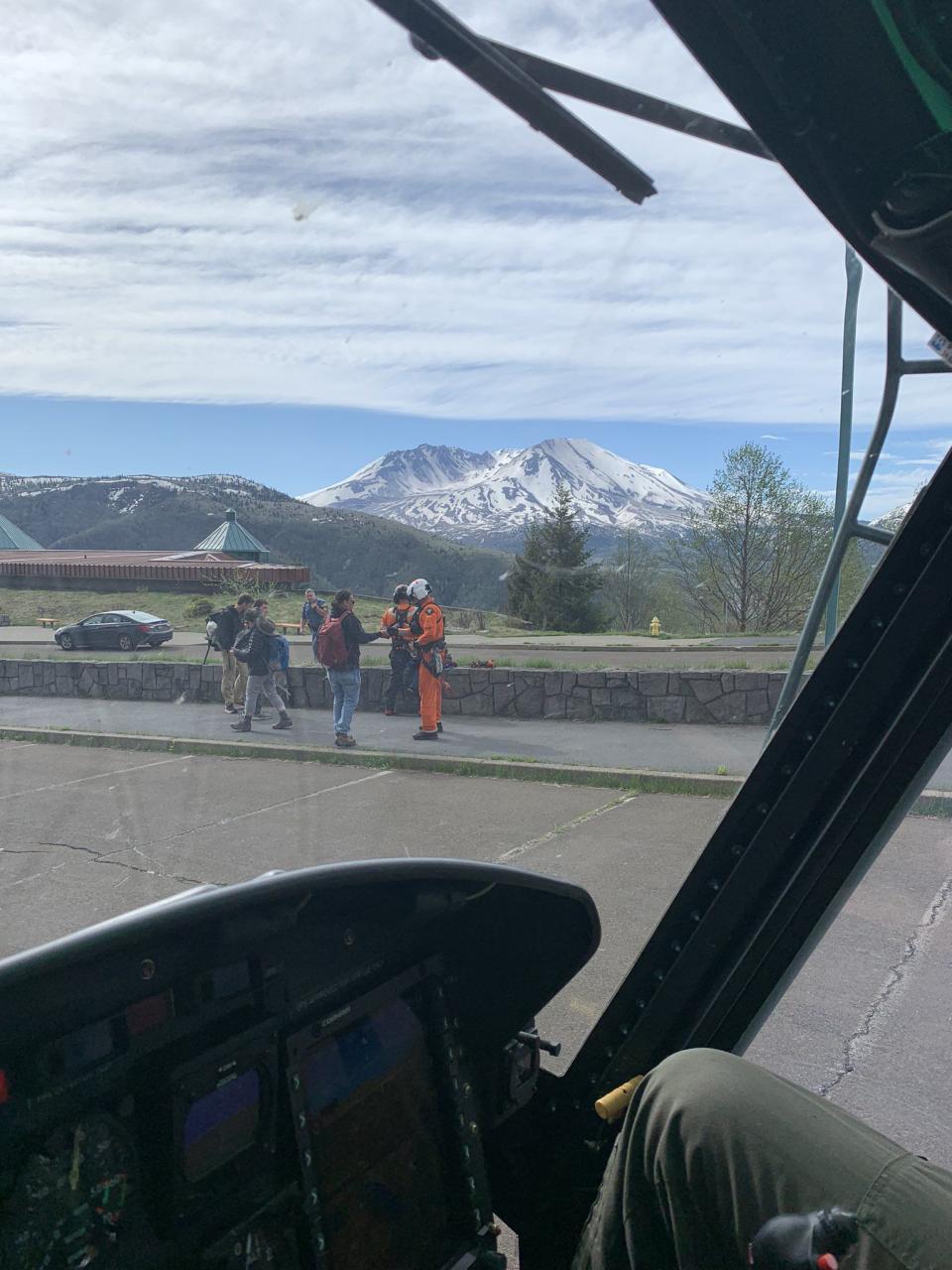 The stranded people and a dog were evacuated by a King County Sheriff's Office helicopter Monday morning.