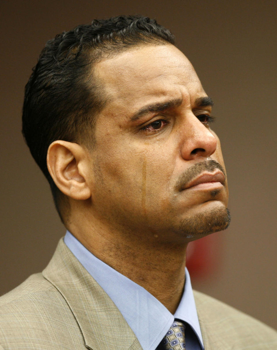 FILE - In this Feb. 23, 2010 file photo, Tears fall down the cheeks of Jayson Williams as he is sentenced to five years in prison, Tuesday Feb. 23, 201,0 at State Superior Court in Somerville, N.J. The teenage daughters of former NBA All-Star Jayson Williams have denounced St. John’s University for its decision to induct their father into the school’s Athletics Hall of Fame. Tryumph and Whizdom Williams both wrote open letters they sent Friday, Oct. 21, 2022, to The Associated Press, and also planned to send to St. John’s, that said the school should be ashamed for his induction into the class during Saturday’s homecoming weekend. (AP Photo/Matt Rainey, Pool, File)