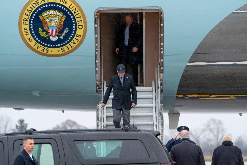 President Joe Biden exits Air Force One after landing at MBS International Airport in Freeland during his stop to Michigan on Thursday, March 14, 2024.