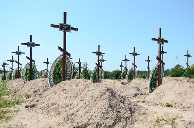Freshly dug graves for unidentified civilians killed by the Russian military in Bucha massacre in February-March 2022 (Photo: Future Publishing via Getty Images)