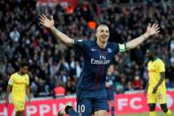 Football Soccer - Paris St Germain v Nantes - French Ligue 1 - Parc des Princes stadium, Paris, France - 14/05/2016. Paris St Germain's Zlatan Ibrahimovic, who plays his final Ligue 1 match for Paris Saint Germain, celebrates after scoring a goal. REUTERS/Gonzalo Fuentes/File Photo