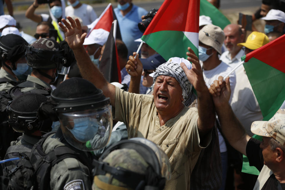 Palestinians protest against expansion of Israeli settlements in the village of Shufa in the West Bank, Tuesday, Sep. 1, 2020.(AP Photo/Majdi Mohammed)