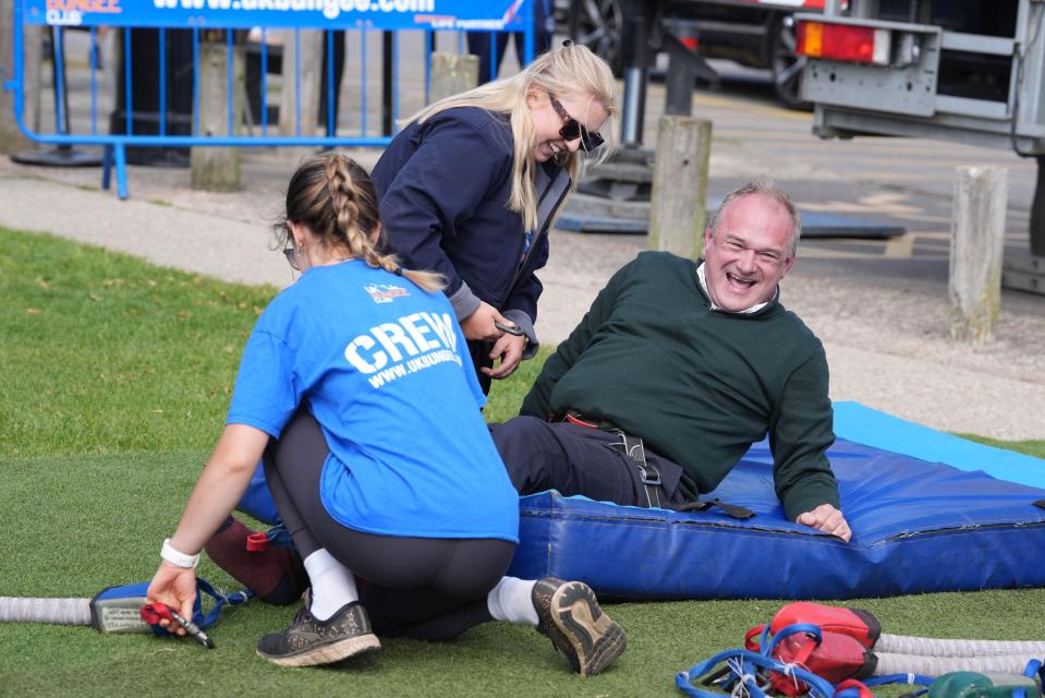 Liberal Democrat leader Sir Ed Davey after taking part in a bungee jump during a visit to Eastbourne Borough Football Club in East Sussex, while on the General Election campaign trail. Picture date: Monday July 1, 2024.