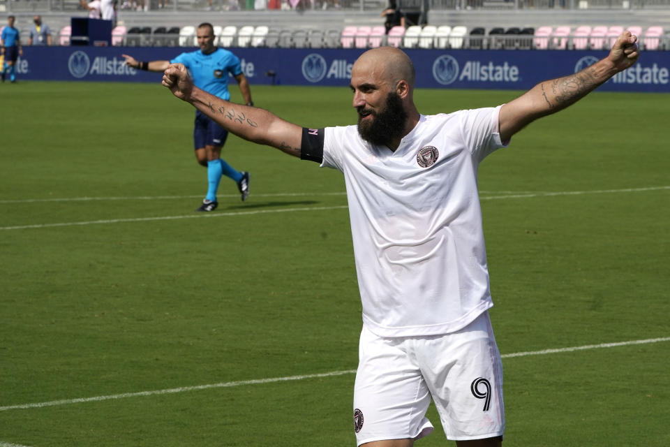 Inter Miami forward Gonzalo Higuain (9) celebrates after an asset on a goal scored by forward Robbie Robinson during the first half of an MLS soccer match against LA Galaxy, Sunday, April 18, 2021, in Fort Lauderdale, Fla. (AP Photo/Lynne Sladky)