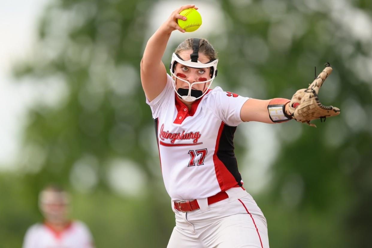 Laingsburg's Addyson Buchin fires a pitch to a Cass City batter during a Division 3 state quarterfinal at Saginaw Valley State University on June, 13, 2023.