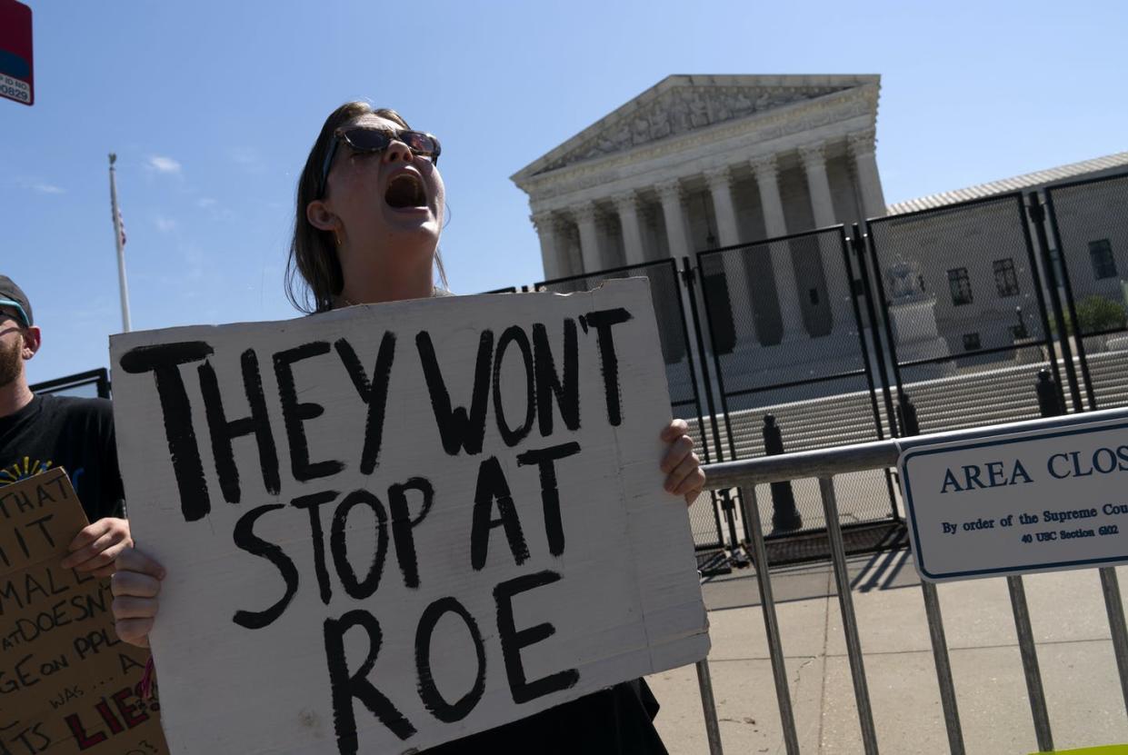 <span class="caption">A demonstrator outside the Supreme Court building expresses fear that other precedents will fall, too.</span> <span class="attribution"><a class="link " href="https://newsroom.ap.org/detail/SupremeCourtAbortion/8841875201f44dab855d8af3c9b24b5d/photo" rel="nofollow noopener" target="_blank" data-ylk="slk:AP Photo/Jose Luis Magana;elm:context_link;itc:0;sec:content-canvas">AP Photo/Jose Luis Magana</a></span>