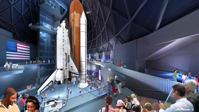 Endeavour assembly at Science Center starts with lifting 52-ton rockets  into place