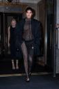 <p>Kylie Jenner has taken the fashion week memo seriously, for the SS22 season. Stepping out to attend a party during New York Fashion Week, at Lucali in midtown, the beauty mogul was photographed wearing a completely sheer bodysuit by LaQuan Smith, paired with pumps and an oversized black blazer. </p><p>The 24-year-old reality TV star-turned-entrepreneur is currently pregnant with her second child and had her baby bump on full display in the see-through lace get-up.</p>