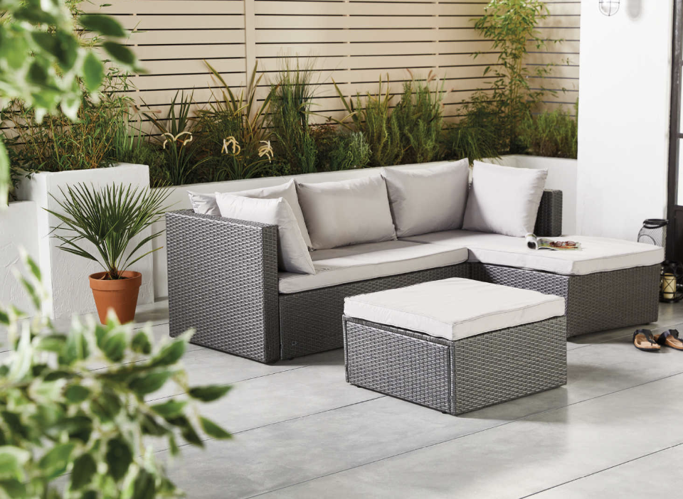 The sofa comes in three colours: light grey, cream and charcoal. (Aldi)