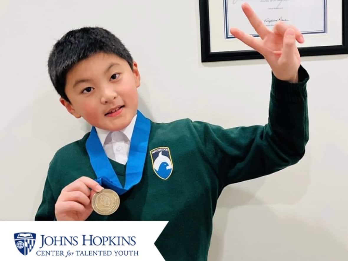 Zhiji Dong, who goes by Jimmy, was honored in a ceremony held by Johns Hopkins Center for Talented Youth after becoming one of the top scorers on an above-grade-level test. (Na Liu - image credit)