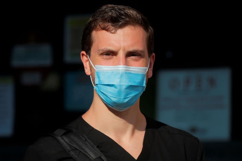 Emergency physician Michael D'Urso poses for a portrait outside his hospital in the Brooklyn borough of New York