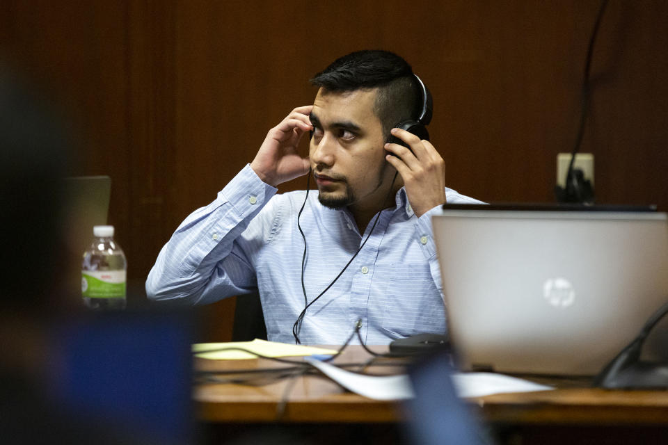 Cristhian Bahena Rivera listens to court proceedings during his trial, Tuesday, May 25, 2021, in the Scott County Courthouse in Davenport, Iowa. Bahena Rivera is on trial for the 2018 stabbing death of Mollie Tibbetts, a University of Iowa student. (Kelsey Kremer/The Des Moines Register via AP, Pool)