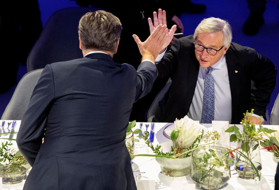 Juncker high fives with the prime minister of Croatia Photo: Getty