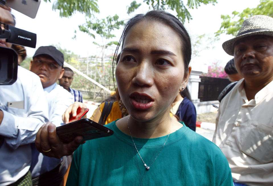 Pan Ei Mon, wife of Reuters journalist Wa Lone, talks to journalists as she leaves the Supreme Court in Naypyitaw, Myanmar, Tuesday, April 23, 2019. Myanmar's Supreme Court on Tuesday rejected the final appeal of two Reuters journalists and upheld seven-year prison sentences for their reporting on the military's brutal crackdown on Rohingya Muslims. (AP Photo/Aung Shine Oo)