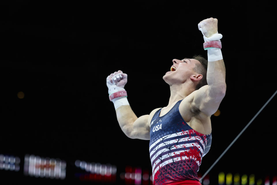 United States' Paul Juda reacts as he competes on the horizontal bar during the Men's team final at the Artistic Gymnastics World Championships in Antwerp, Belgium, Tuesday, Oct. 3, 2023. (AP Photo/Geert Vanden Wijngaert)