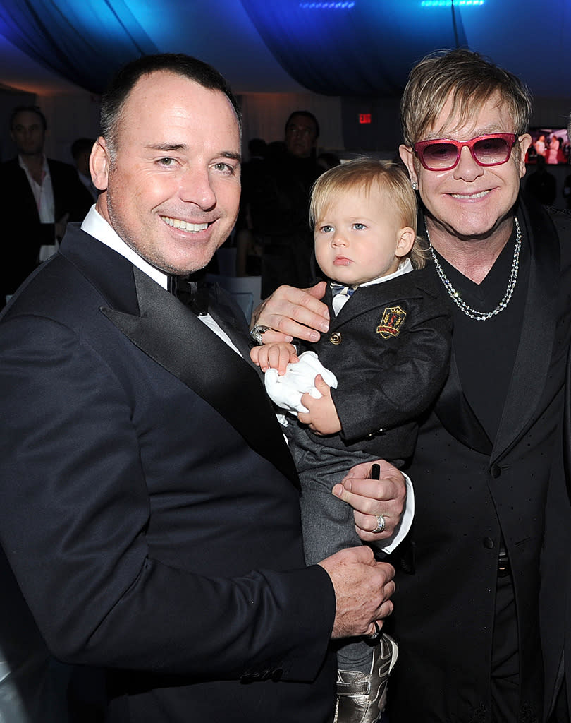 David Furnish and Elton John accessorized with their son, baby Zachary.<br><br>