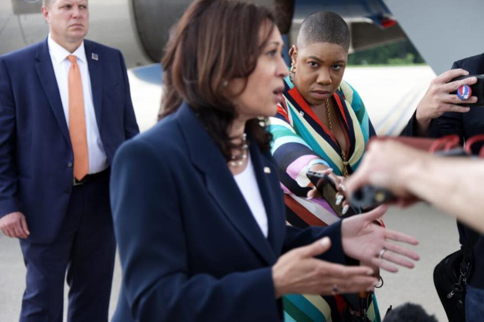 U.S. Vice President Kamala Harris speaks to members of the press as her press secretary Symone D. Sanders looks on at Greenville-Spartanburg International Airport before she boards Air Force Two to return to Washington, D.C., June 14, 2021 in Greer, South Carolina. (Photo by Alex Wong/Getty Images)