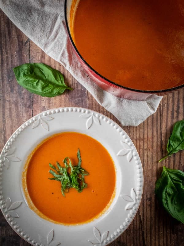 <p>Saporita Kitchen</p><p>This quick, easy and ultra-creamy weeknight soup is perfect with a slice of fresh crusty bread.</p><p><strong>Get the recipe: </strong><a href="https://saporitokitchen.com/creamy-tomato-soup-with-mascarpone/?fbclid=IwAR0vkSVKDphjOjbQ8wmGiHpcFGHrPIiBQMIP2ppkTJRuNzcWJquqENvoRCg" rel="nofollow noopener" target="_blank" data-ylk="slk:Creamy Tomato Soup with Mascarpone;elm:context_link;itc:0;sec:content-canvas" class="link rapid-noclick-resp"><strong>Creamy Tomato Soup with Mascarpone</strong></a></p>
