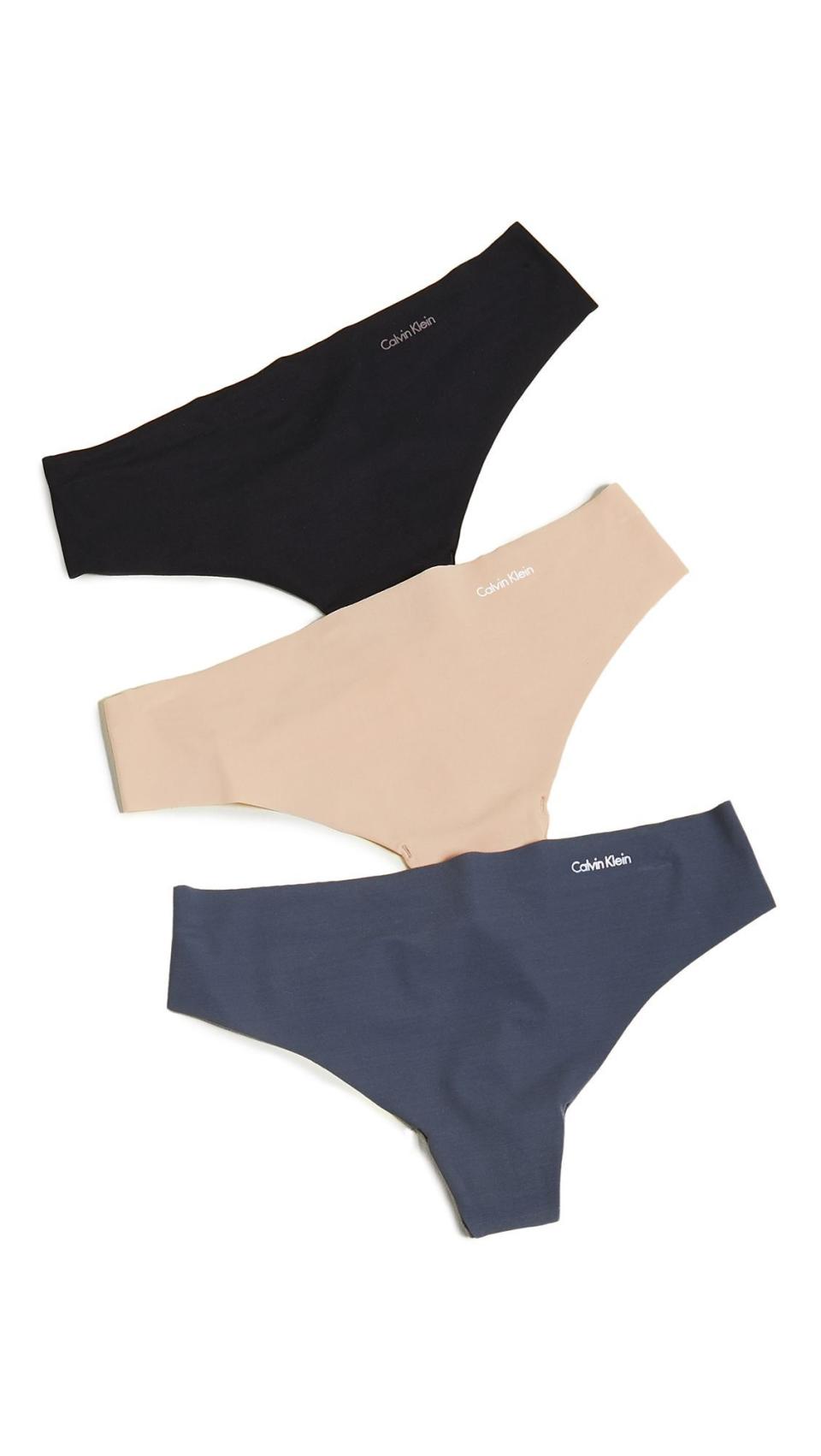 13) Calvin Klein Women's Invisibles Thongs (Set of 3)