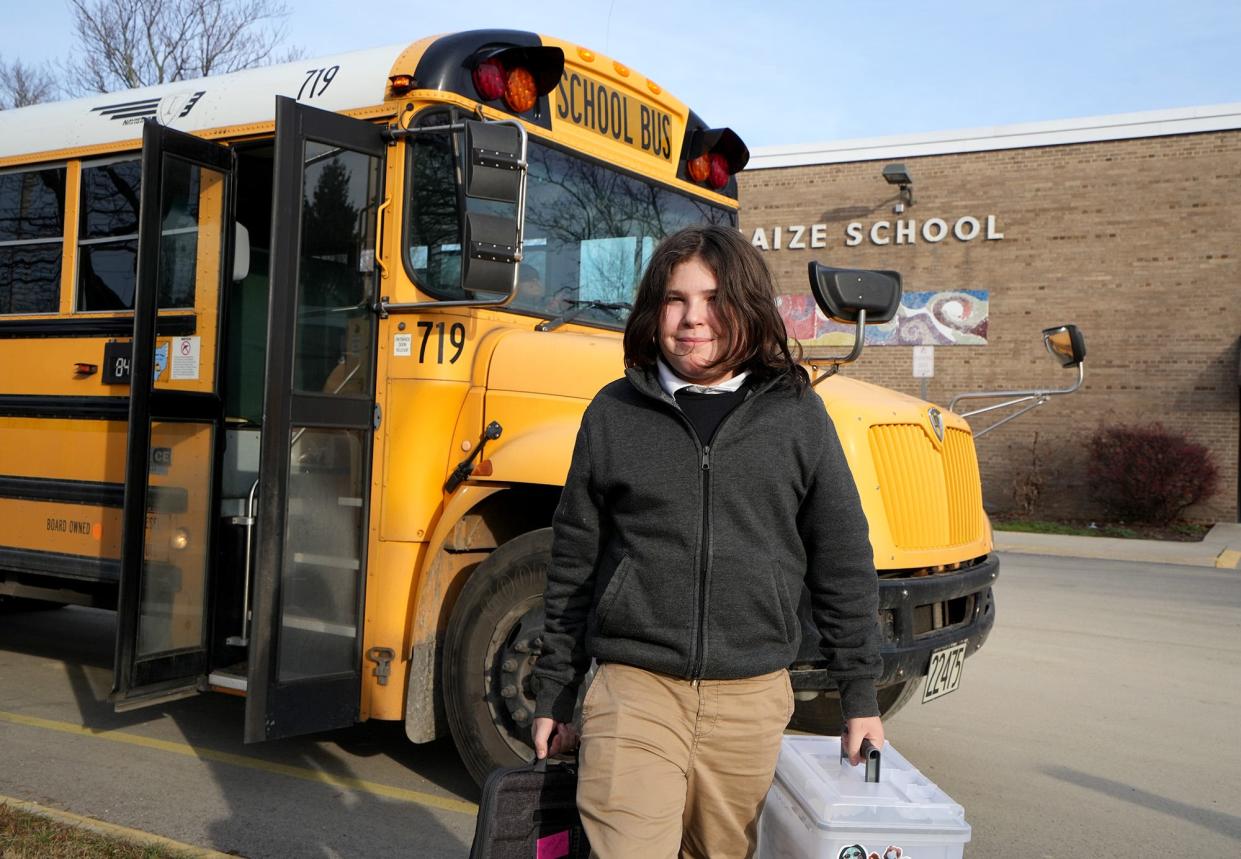 Regina Prince's 11-year-old son, Caiden, a sixth grader in Columbus City Schools is getting a new school bus route when school resumes after the winter break. Caiden is seen here Dec. 13 getting off a bus in front of Maize Elementary School, where he picks up his 7-year-old sister, Jade, who goes to school there.  Their mom, Regnext semester. Caiden gets off a bus front of Maize Elementary where he picks up his younger sister, Jade 7, who goes to Maize Elementary. Their mom, Regina, then took them home.