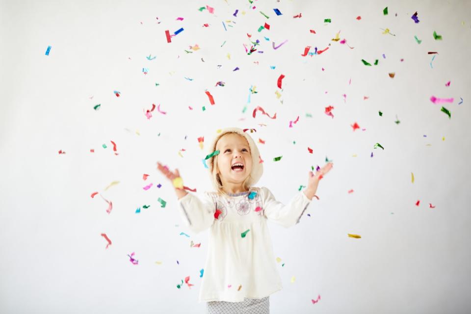 An image of a girl celebrating.