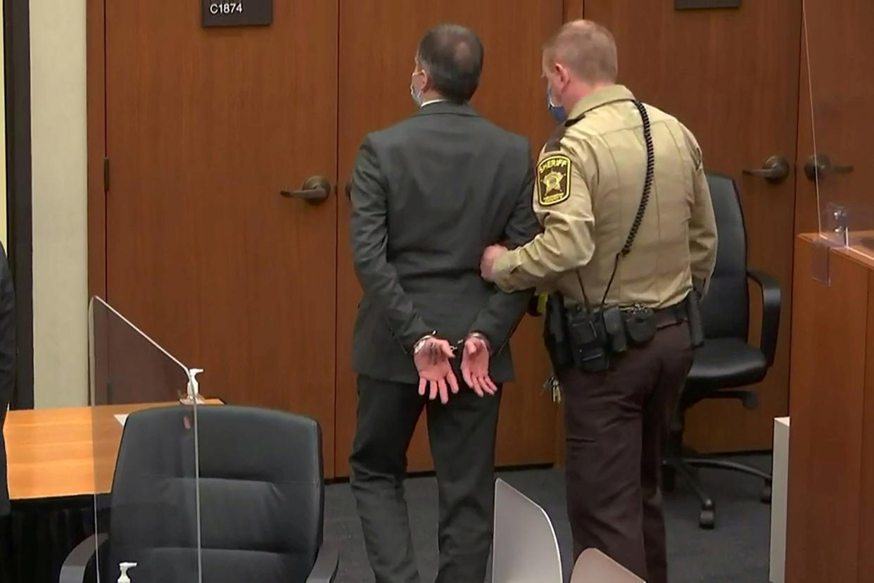 Former Minneapolis police officer Derek Chauvin is led away in handcuffs after a jury found him guilty of all charges in his trial for second-degree murder, third-degree murder and second-degree manslaughter in the death of George Floyd in Minneapolis, Minnesota, U.S. April 20, 2021 in a still image from video.  Court TV/Pool via Reuters)