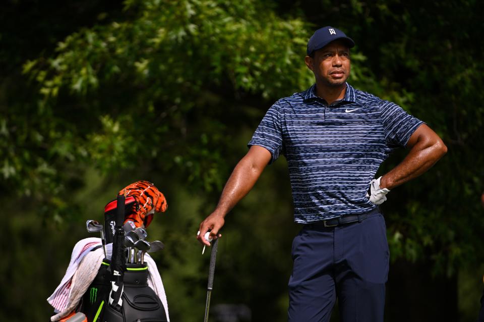 Tiger Woods waits to tee off on the 17th hole during Thursday's first round of the PGA Championship in Tulsa, Oklahoma. Woods finished with a 74.