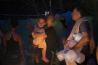 <p>People affected by Hurricane Maria collect water in the mountains in Naranjito, Puerto Rico, Wednesday, Sept. 27, 2017. (Photo: Ramon Espinosa/AP) </p>