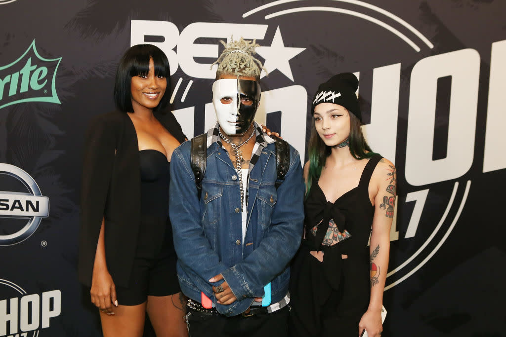XXXTentacion (center) attends the BET Hip Hop Awards 2017 on Oct. 6, 2017. (Photo by Thaddaeus McAdams/FilmMagic)
