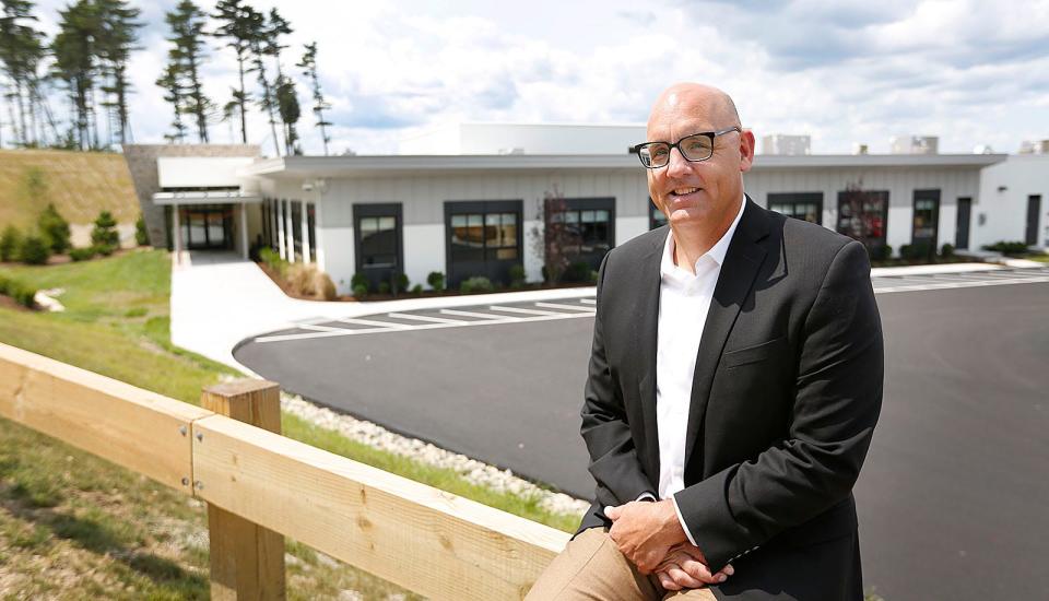 Executive Director and founder Ryan Plosker outside New England Academy in Marshfield. New England Academy, a school for grades 7-12 serving students with social and emotional needs, will open Aug. 17.