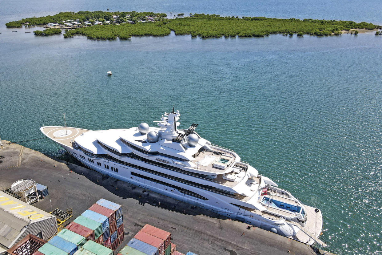 FILE - The superyacht Amadea is docked at the Queens Wharf in Lautoka, Fiji, on April 15 2022. The superyacht that American authorities say is owned by a Russian oligarch previously sanctioned for alleged money laundering has been seized by law enforcement in Fiji, the U.S. Justice Department announced Thursday, May 5. (Leon Lord/Fiji Sun via AP, File)