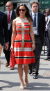 <p>A striped, and pleated skirt, was Pippa’s choice for a day out at Wimbledon in 2013. <i>[Photo: Rex]</i> </p>