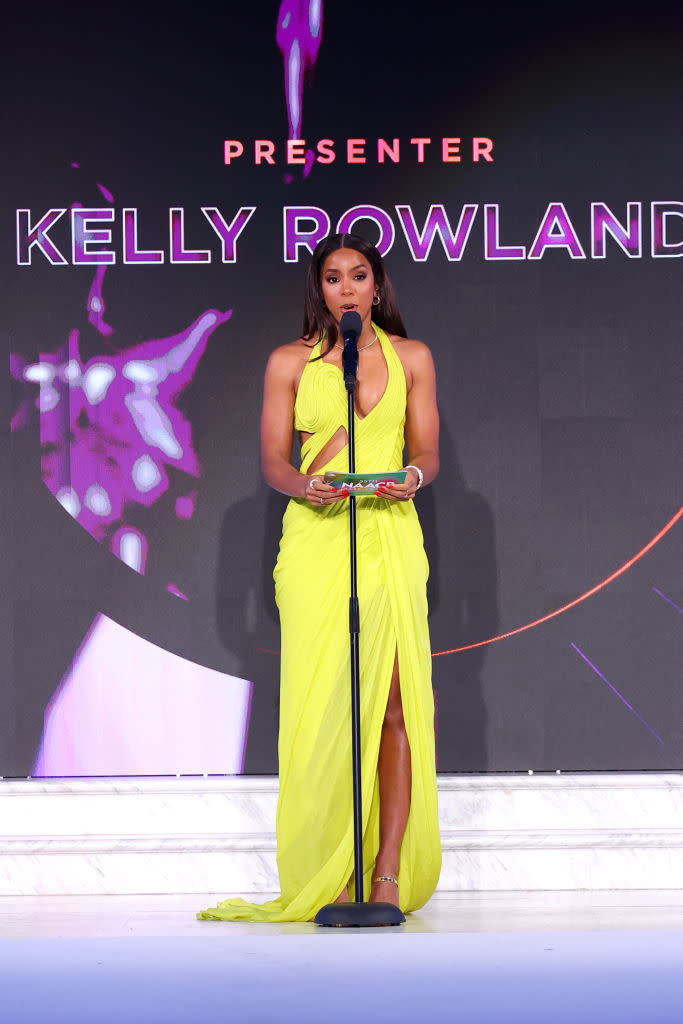 LOS ANGELES, CALIFORNIA - MARCH 15: Kelly Rowland speaks on stage during the NAACP Fashion Show at Vibiana on March 15, 2024 in Los Angeles, California.  (Photo by Leon Bennett/Getty Images for the NAACP)