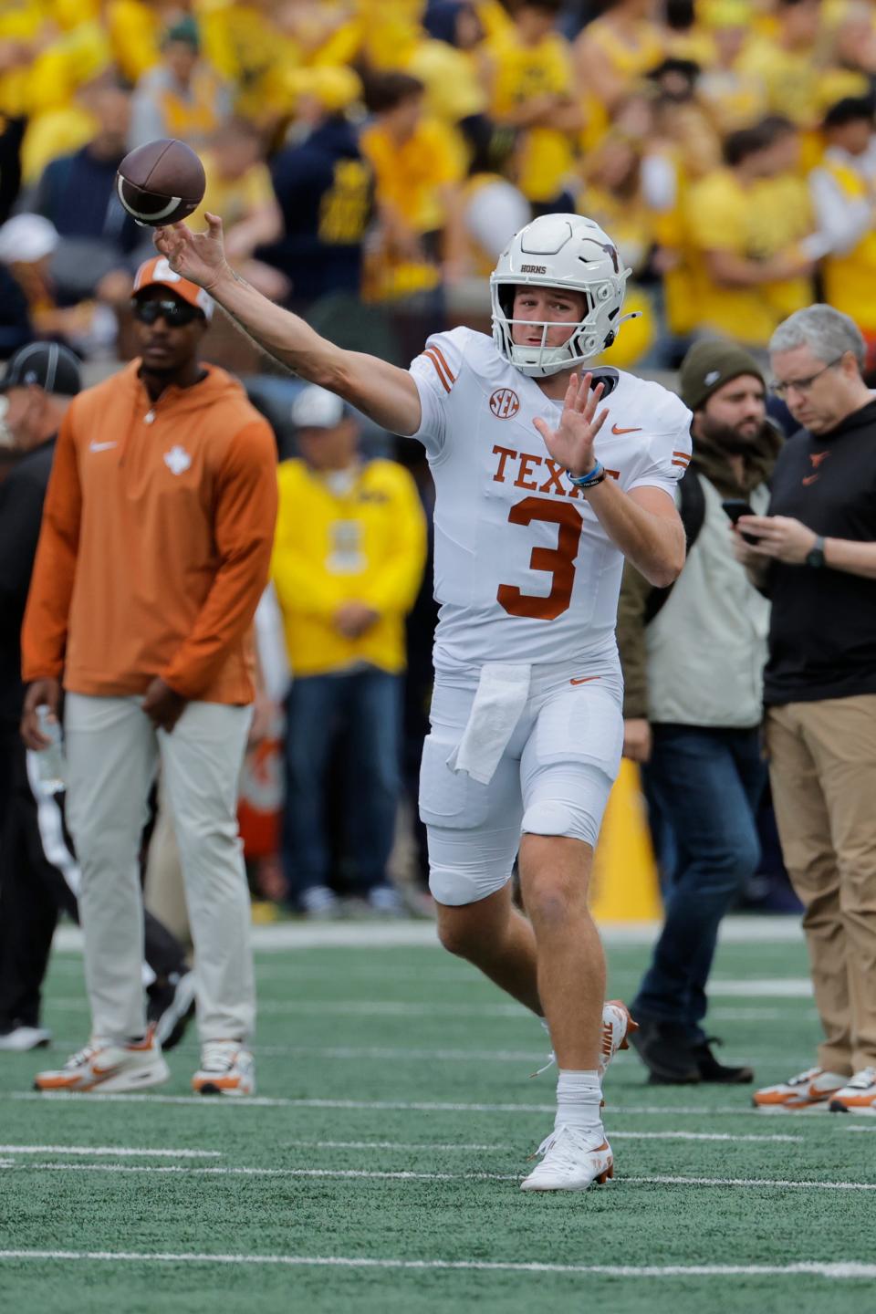 Texas quarterback Quinn Ewers warms up before the Longhorns' top-10 matchup Saturday at No. 9 Michigan.