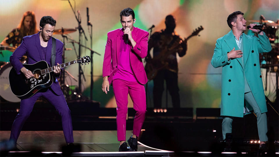 Kevin Jonas, Joe Jonas, Nick Jonas. Kevin Jonas, from left, Joe Jonas, and Nick Jonas, of The Jonas Brothers, perform on stage during their "Happiness Begins" tour at the Capitol One Arena, in WashingtonJonas Brothers in Concert - , D.C., Washington, USA - 15 Aug 2019