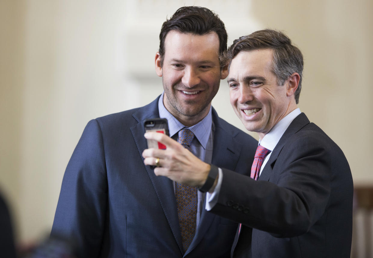 State Sen. Van Taylor, R-Plano, right, takes a selfie with Tony Romo. (AP)