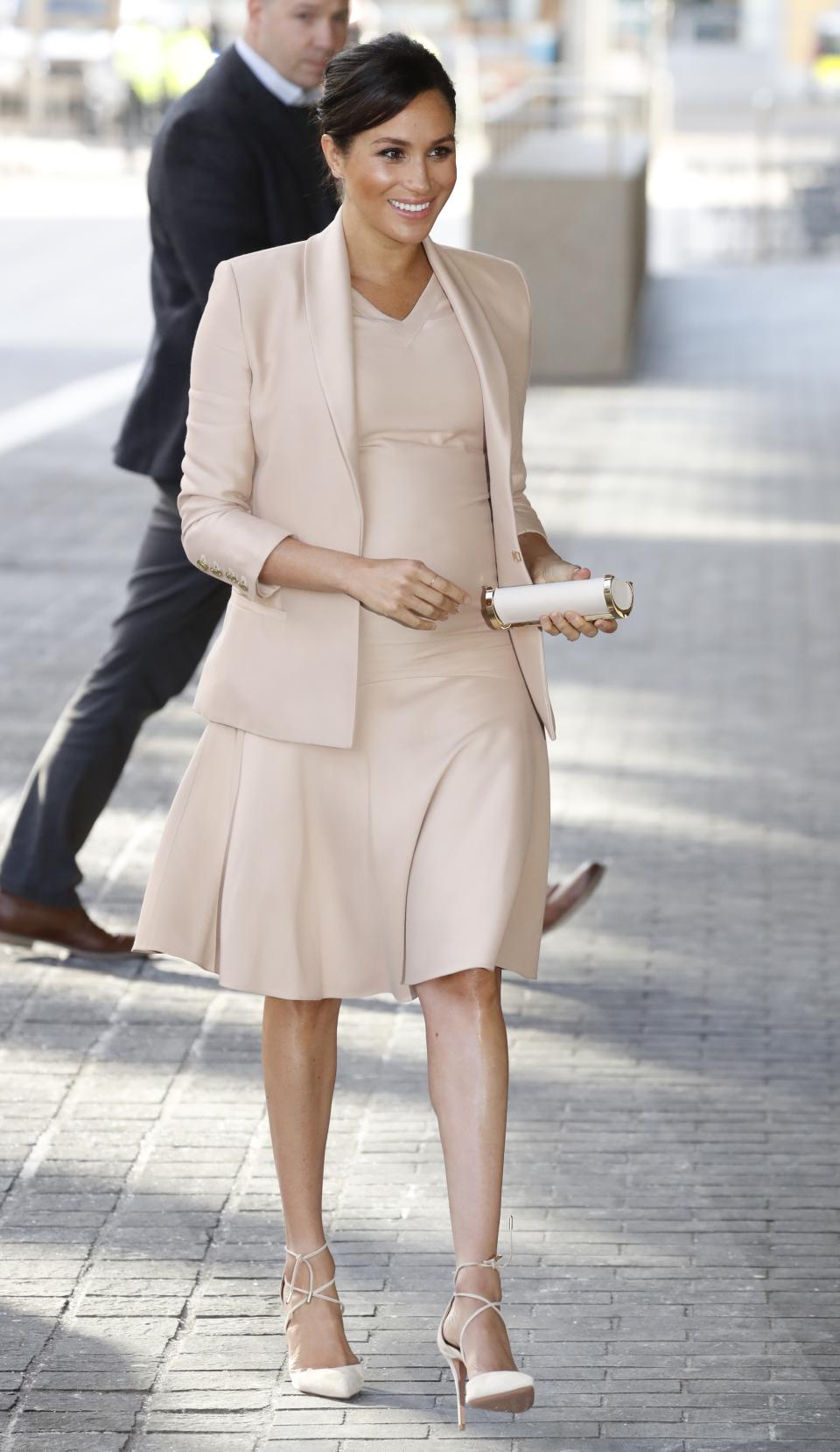 Blush pink is a mainstay in Meghan Markle's royal wardrobe, so she was bound to include it in a maternity look eventually.